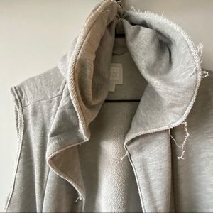 Sweater vest with raw edges